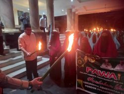 Pj Bupati Parimo Resmi Melepas Pawai Obor Menyambut Ramadhan 1445 Hijriah